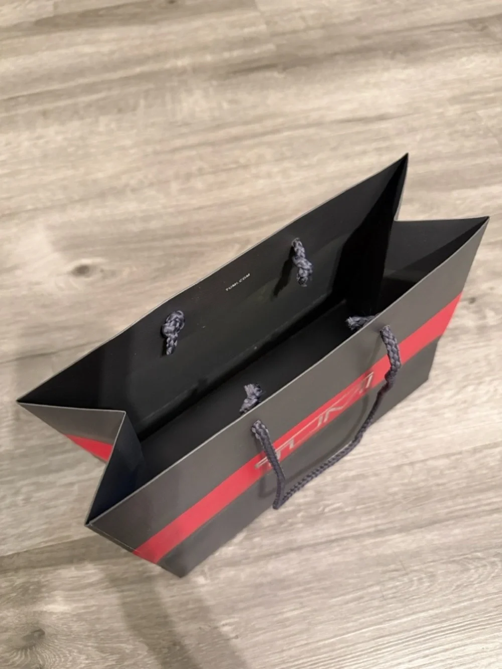 Tumi Black with Red Stripe Paper Shopping Bag